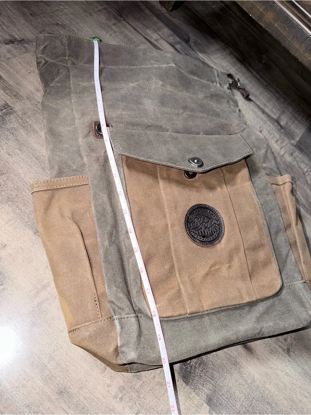 Waxed Canvas Roll-Top Backpack in army green and Brown